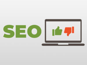 SEO with Laptop and Thumbs Up and Down