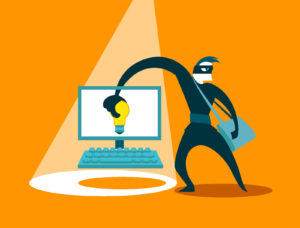 Animation of thief stealing lightbulb idea from computer screen